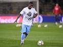 Lazio's Bastos warms up with a picture of Anne Frank on his shirt ahead of the match against Bologna on October 25, 2017 