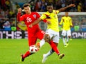 England's Dele Alli in action with Colombia's Jefferson Lerma on July 3, 2018