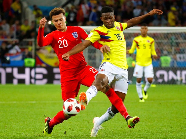 England's Dele Alli in action with Colombia's Jefferson Lerma on July 3, 2018