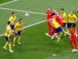 England's Harry Maguire scores their first goal against Sweden on July 7, 2018