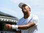 Britain's Jay Clarke reacts during the first-round match against Latvia's Ernests Gulbis at Wimbledon on July 3, 2018