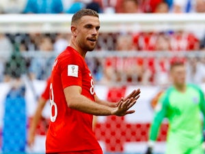 England's Jordan Henderson gestures in the match against Sweden on July 7, 2018