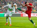  Portugal's Goncalo Guedes in action with Algeria's Ramy Bensebaini on June 7, 2018