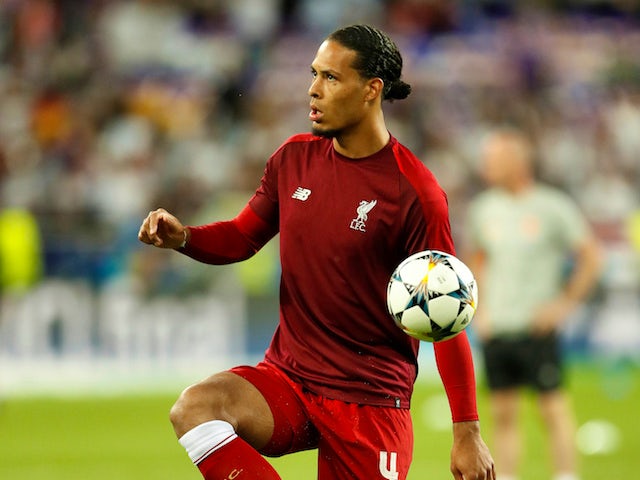 Liverpool defender Virgil van Dijk warms up ahead of the 2018 Champions League final with Real Madrid