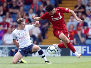 Liverpool fire blank in Bury stalemate