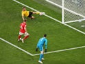 Eric Dier has his shot cleared off the line by Toby Alderweireld during the World Cup third-place playoff between Belgium and England on July 14, 2018