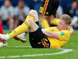 Kevin De Bruyne winces after going down during the World Cup third-place playoff between Belgium and England on July 14, 2018