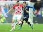 Marcelo Brozovic and Antoine Griezmann in action during the World Cup final between France and Croatia on July 15, 2018