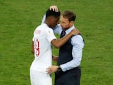 England manager Gareth Southgate consoles Marcus Rashford following his side's World Cup semi-final defeat to Croatia on July 11, 2018