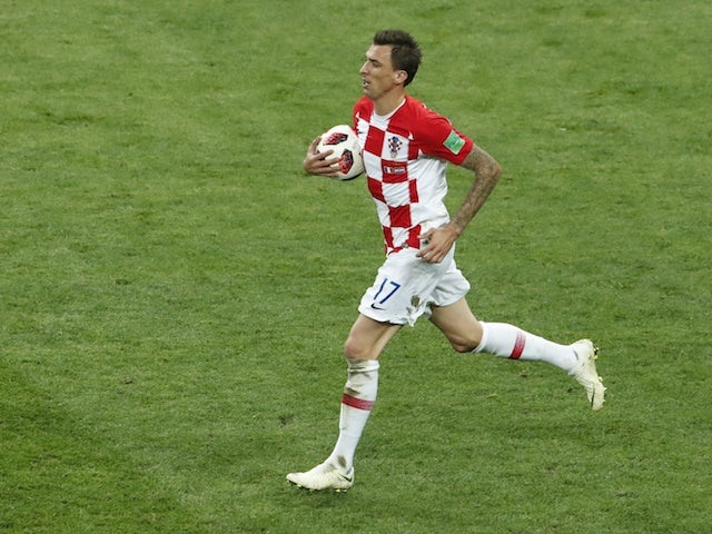 Mario Mandzukic scores for his own side during the World Cup final between France and Croatia on July 15, 2018