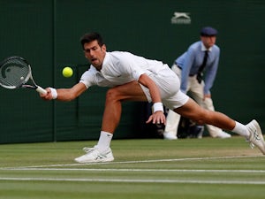 Djokovic overcomes Nishikori in four sets