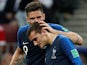 Olivier Giroud congratulates Antoine Griezmann after his penalty goal during the World Cup final between France and Croatia on July 15, 2018