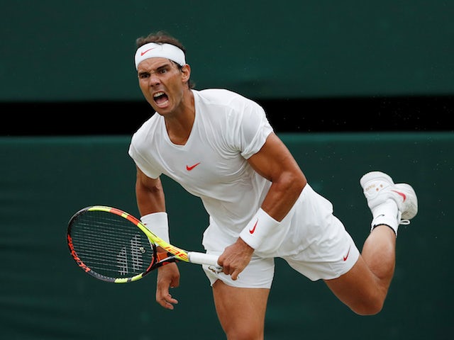 Rafael Nadal in action against Novak Djokovic in their Wimbledon semi-final on July 14, 2018