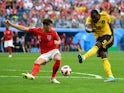 Romelu Lukaku shoots past John Stones during the World Cup third-place playoff between Belgium and England on July 14, 2018