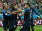 France defender Samuel Umtiti celebrates with teammates after scoring the opening goal of his side's World Cup semi-final with Belgium on July 10, 2018