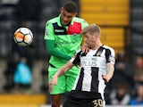 Notts County's Jonathan Stead in action with Oxford City's Christian Oxlade-Chamberlain on December 2, 2017 