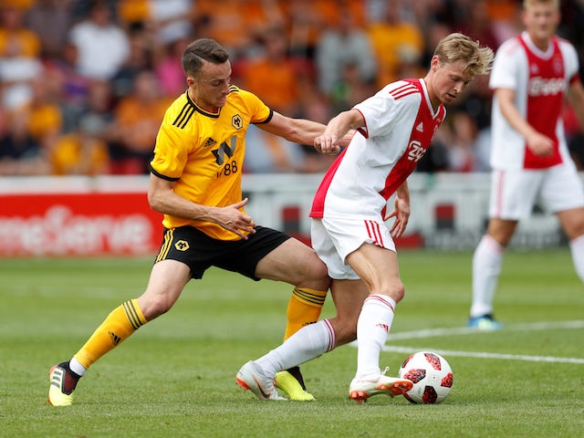 Diogo Jota and Frenkie de Jong in action during the pre-season friendly between Ajax and Wolverhampton Wanderers on July 19, 2018