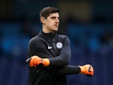Chelsea goalkeeper Thibaut Courtois warms up prior to a Premier League game in March 2018