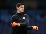 Chelsea goalkeeper Thibaut Courtois warms up prior to a Premier League game in March 2018