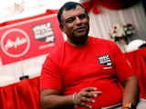 Queens Park Rangers owner Tony Fernandes sports a delightful red T-shirt at a press conference on May 15, 2018