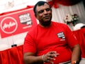 Queens Park Rangers owner Tony Fernandes sports a delightful red T-shirt at a press conference on May 15, 2018
