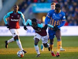 West Ham United's Domingos Quina in action with Shrewsbury Town's Arthur Gnahoua on January 7, 2018 