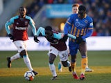 West Ham United's Domingos Quina in action with Shrewsbury Town's Arthur Gnahoua on January 7, 2018 