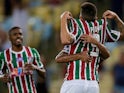 Fluminense players celebrate a goal on April 11, 2018