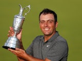Italy's Francesco Molinari celebrates with the Claret Jug after winning the 147th Open Championship on July 22, 2018 