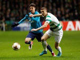 Zenit St Petersburg's Emiliano Rigoni in action with Celtic's Jozo Simunovic on February 15, 2018 