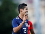 Japan's Yoshinori Muto reacts during the match against Switzerland on June 8, 2018 