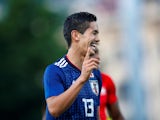 Japan's Yoshinori Muto reacts during the match against Switzerland on June 8, 2018 
