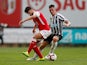 Ciaran Clark and Xadas in action during the pre-season friendly between Braga and Newcastle United on August 1, 2018