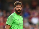 Liverpool goalkeeper Alisson Becker in action during a pre-season friendly with Napoli