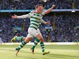 Callum McGregor celebrates his opener during the Champions League qualifying game between Celtic and AEK Athens on August 8, 2018