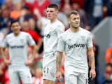 A dejected Jack Wilshere during the Premier League game between Liverpool and West Ham United on August 12, 2018
