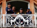 Joe Root, Stuart Broad, Adil Rashid and Ollie Pope observe as rain washes out the first day of the second Test between England and India at Lord's on August 9, 2018