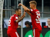 Joshua Kimmich and Thiago celebrate the opener during the German Super Cup game between Eintracht Frankfurt and Bayern Munich on August 12, 2018