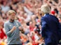 Jurgen Klopp celebrates in Manuel Pellegrini's face during the Premier League game between Liverpool and West Ham United on August 12, 2018