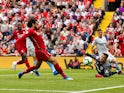 Mohamed Salah scores the opener during the Premier League game between Liverpool and West Ham United on August 12, 2018
