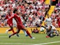 Mohamed Salah scores the opener during the Premier League game between Liverpool and West Ham United on August 12, 2018