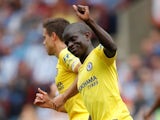Chelsea midfielder N'Golo Kante celebrates scoring the opening goal of his side's Premier League clash with Huddersfield Town on August 11, 2018