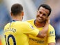 Chelsea attacker Pedro celebrates with Eden Hazard after scoring during his side's Premier League clash with Huddersfield on August 11, 2018