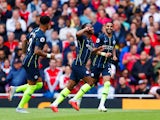 Raheem Sterling celebrates scoring during the Premier League game between Arsenal and Manchester City on August 12, 2018