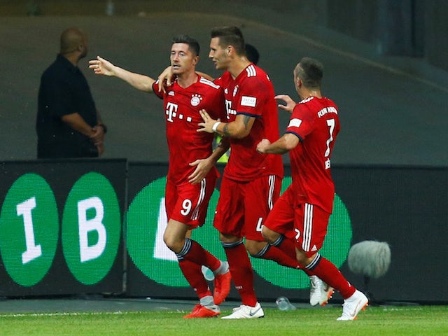 Robert Lewandowski celebrates scoring the second during the German Super Cup game between Eintracht Frankfurt and Bayern Munich on August 12, 2018