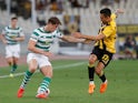Jack Hendry and Viktor Klonaridis in action during the Champions League qualifying game between AEK Athens and Celtic on August 14, 2018