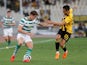 Jack Hendry and Viktor Klonaridis in action during the Champions League qualifying game between AEK Athens and Celtic on August 14, 2018