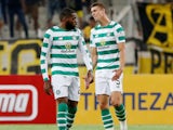 Olivier Ntcham and Jozo Simunovic look dejected after the opposition's second during the Champions League qualifying game between AEK Athens and Celtic on August 14, 2018