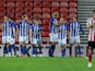 Sheffield Wednesday midfielder Adam Reach celebrates with teammates after scoring during his side's EFL Cup clash with Sunderland on August 16, 2018