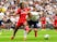 Fulham's Timothy Fosu-Mensah challenges Tottenham Hotspur's Harry Kane on August 18, 2018